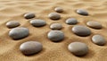 Smooth, oval-shaped stones rest on a textured, sandy surface Royalty Free Stock Photo