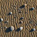 Pebbles vary in size, with some larger and distinctively round Royalty Free Stock Photo