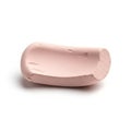 Smooth pink soap bar with a slightly curved shape and roughened ends Royalty Free Stock Photo