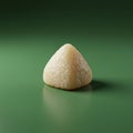 A smooth, pyramid-shaped object with a creamy, off-white texture sits on a matte Royalty Free Stock Photo