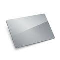 A smooth, rectangular metal object with rounded edges, slightly elevated from the Royalty Free Stock Photo