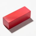 A smooth red rectangular block under neutral lighting with a subtle shadow. isolated on white background Royalty Free Stock Photo