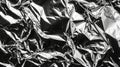 A smooth, reflective metallic background made from silvergray foil texture. Royalty Free Stock Photo