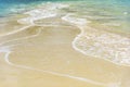 Smooth sand and beautiful waves, suitable as a background for writing messages Royalty Free Stock Photo