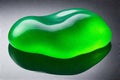 Green jelly blob mockup on glossy surface