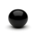 A smooth, shiny black sphere is centrally positioned on a white Royalty Free Stock Photo