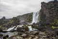 Smooth silky water on Pingvellir waterfall Oxarafoss in Iceland Royalty Free Stock Photo