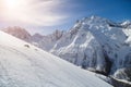 Smooth ski slopes of the Caucasus Mountains on a sunny winter day Royalty Free Stock Photo