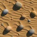 Smooth stones of various sizes rest on a sandy surface, creating a pattern. The sand features Royalty Free Stock Photo