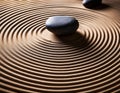 The smooth surface of a Japanese Zen garden with concentric circles around rocks, epitomizing calmness and focus Royalty Free Stock Photo