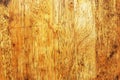 Smooth surface and texture of old softwood with brown stains, wood background