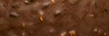 Chocolate photo background.Smooth texture of milk chocolate.