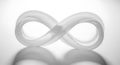 A smooth, translucent infinity symbol rendered in a glossy, white material appear Royalty Free Stock Photo