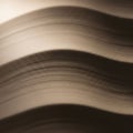 Smooth, undulating sand dunes create a pattern of light and shadow Royalty Free Stock Photo