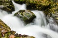 Smooth water surface of waterfall in the autumn, long exposure effect Royalty Free Stock Photo