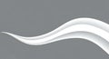 Smooth white flowing curves on a solid gray field Royalty Free Stock Photo
