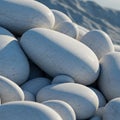Smooth, white pebbles are piled closely together, creating a uniform, rounded Royalty Free Stock Photo