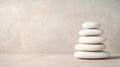 Smooth white pebbles stacked on sandy surface, creating serene atmosphere Royalty Free Stock Photo