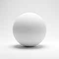 Smooth White Sphere Centered on a Softly Lit White Background with Subtle Shadow ball Royalty Free Stock Photo