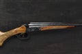 Smoothbore hunting gun on black background close up Royalty Free Stock Photo