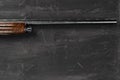 Smoothbore hunting gun on black background close up Royalty Free Stock Photo