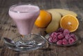 Smoothie of banana, orange juice , frozen raspberry with yogur Royalty Free Stock Photo