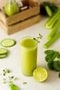 Smoothie with banana, spinach and lime. Healthy detox green drink glass Royalty Free Stock Photo