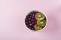 Smoothie bowl with acai, banana, blueberries, kiwi fruit and black currants. Healthy super food with fresh fruit. Vegetarian and Royalty Free Stock Photo