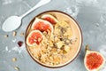 Smoothie bowl with figs, peanut butter and muesli. Royalty Free Stock Photo