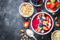 Smoothie bowl from fresh berries, nuts and granola. Royalty Free Stock Photo