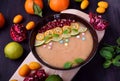 Smoothie bowl garnished with kumquats, pomegranate, lime and mint Royalty Free Stock Photo