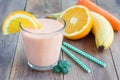 Smoothie with carrot, banana, orange and yogurt