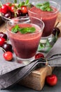 Smoothie with cherry in a glass