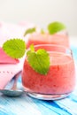 Smoothie drink with mint on table, in high key Royalty Free Stock Photo