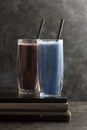 Smoothie glasses with spirulina powder. Fresh banana, blueberry healthy detox drinks