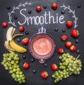 Smoothie ingredients on white wooden background, top view, border. Superfoods and health detox diet food concept strawberries,