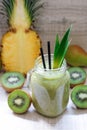 Smoothie of kiwi, pineapple and pears.