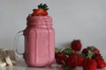 Smoothie made of fresh strawberries, banana and almond milk Royalty Free Stock Photo