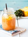 smoothie with tropical fruits, pineapple, peach and green buckwheat, raw