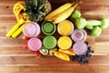 Smoothie variation. Healthy lifestyle concept. sport fitness equipment-several bottles with fruit and berry juices smoothies or