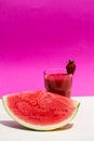 Smoothie with watermelon, pink background
