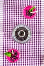 Smoothies of black currant in glass glasses with straws on a white wooden table. Top view. Royalty Free Stock Photo