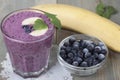 Smoothies of frozen blueberries and banana with yogurt. Royalty Free Stock Photo