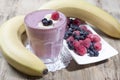 Smoothies of frozen raspberries, blueberries and banana with yo Royalty Free Stock Photo