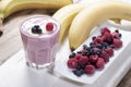 Smoothies of frozen raspberries, blueberries and banana with yo Royalty Free Stock Photo