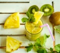 Smoothies of kiwi and pineapple on the table. Top view Royalty Free Stock Photo