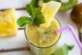 Smoothies of kiwi and pineapple on the table. Top view Royalty Free Stock Photo