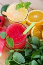 Smoothies from orange and tangerine and smoothie from watermelon Royalty Free Stock Photo