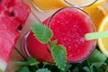 Smoothies from orange and tangerine and smoothie from watermelon Royalty Free Stock Photo