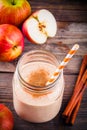 Smoothies with red apple and cinnamon in a glass mason jar